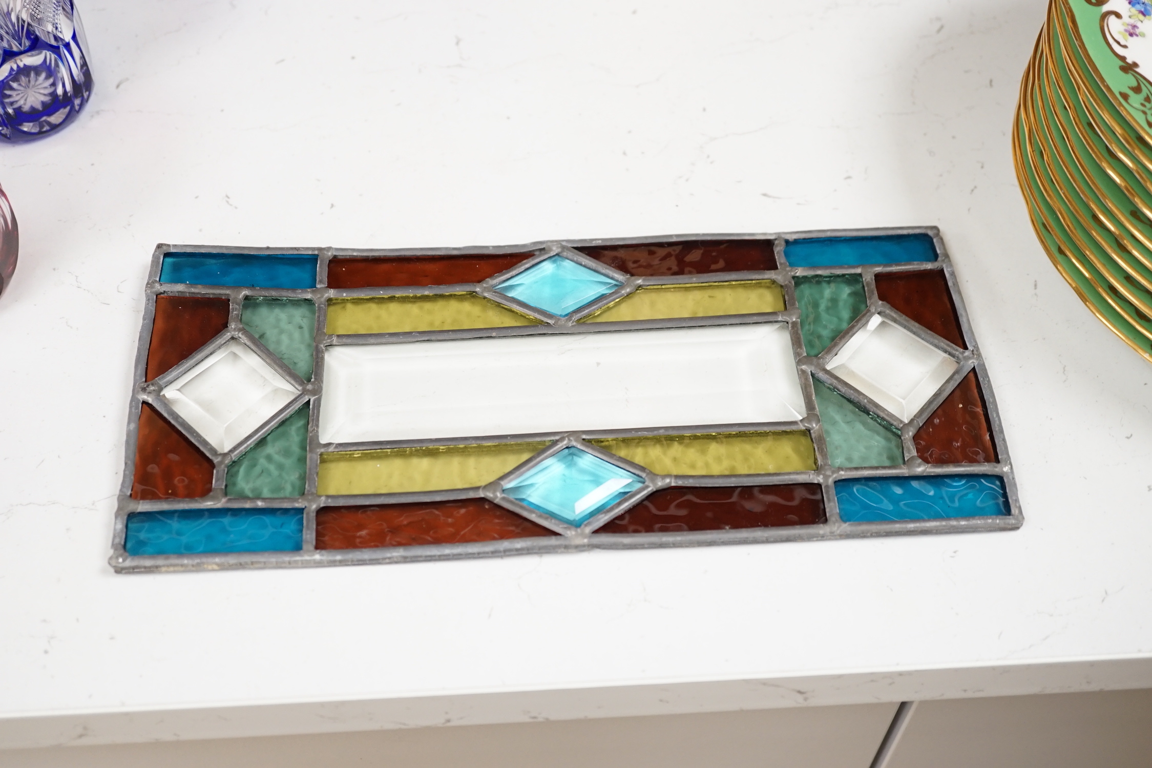 A stained glass three sided wall light, 38cm high